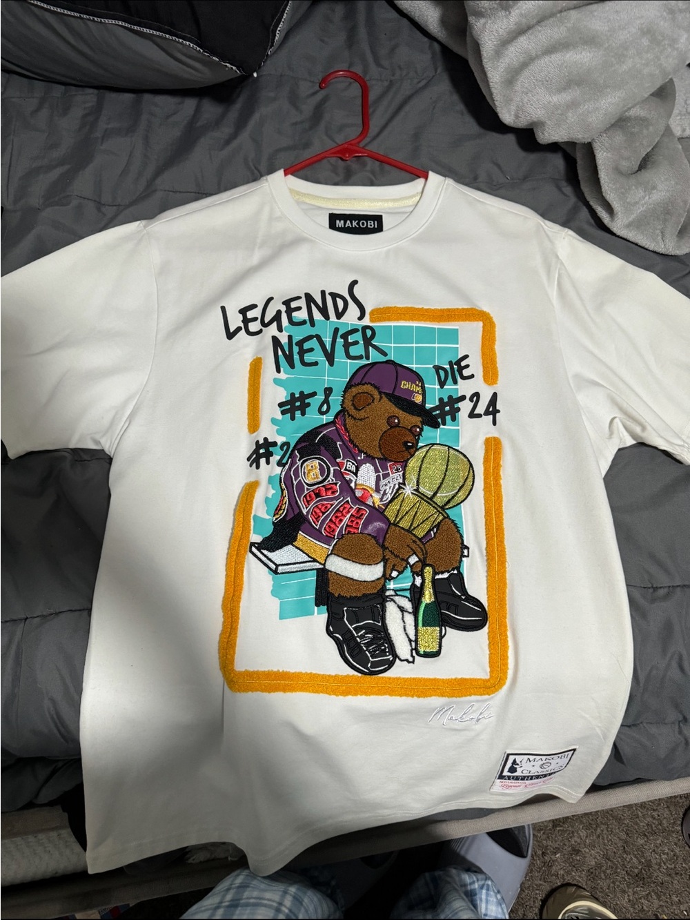 MAKOBI White Graphic 'Legends Never Die' Bear Tee
